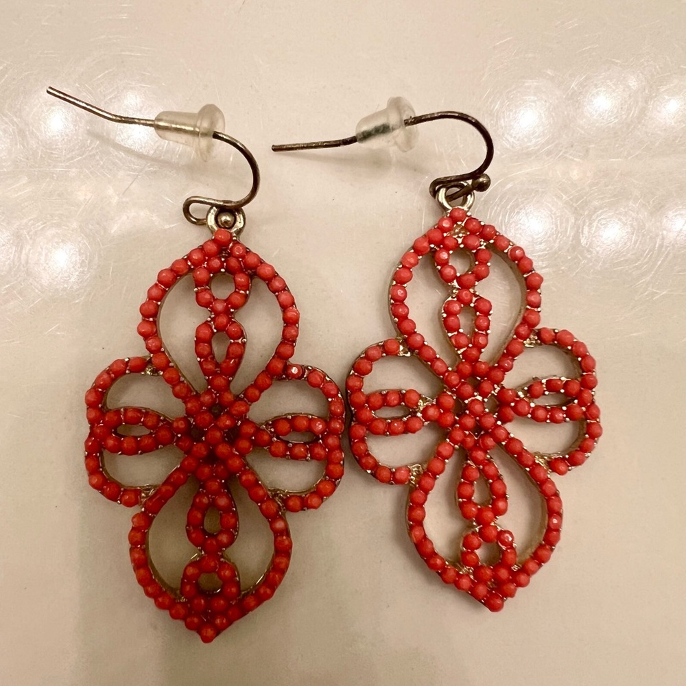 Coral beaded dangly earrings. 1.5 inches long, 1 inch wide.